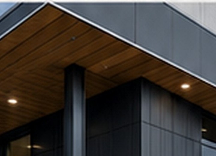Modern cladding detail with warm soffit lighting