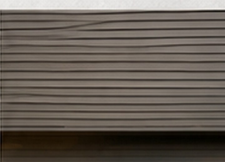 Horizontal aluminum siding on a modern exterior wall