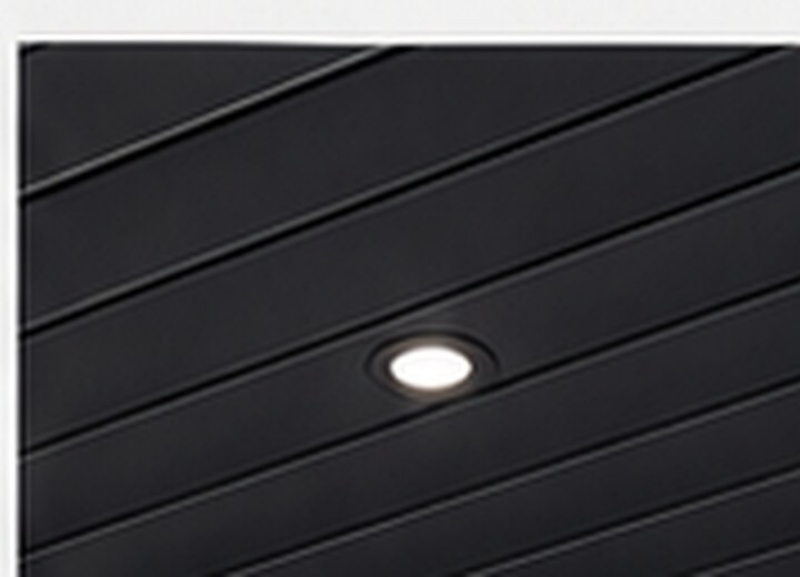 Solid soffit panels with recessed light